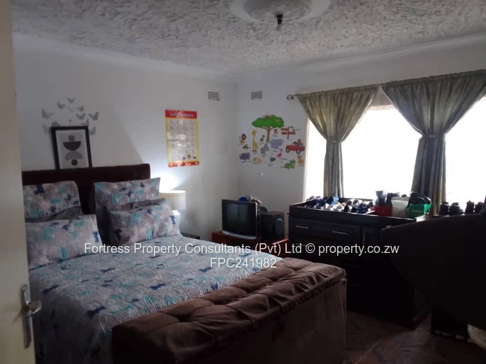 Brick 3-Bed Home in Mainway Meadows — Garage, Water Tank